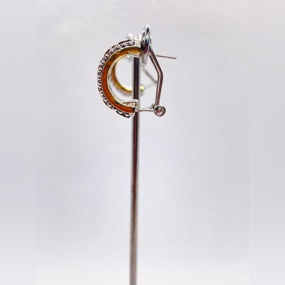 Beautiful gold and silver tone hoops. Gold circular design with one piece clasp. - Picture 6 of 12